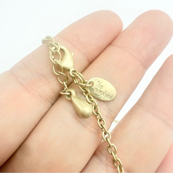 LIA SOPHIA Matte Gold Tone Hammered
Disk Signed Necklace - Picture 5 of 10